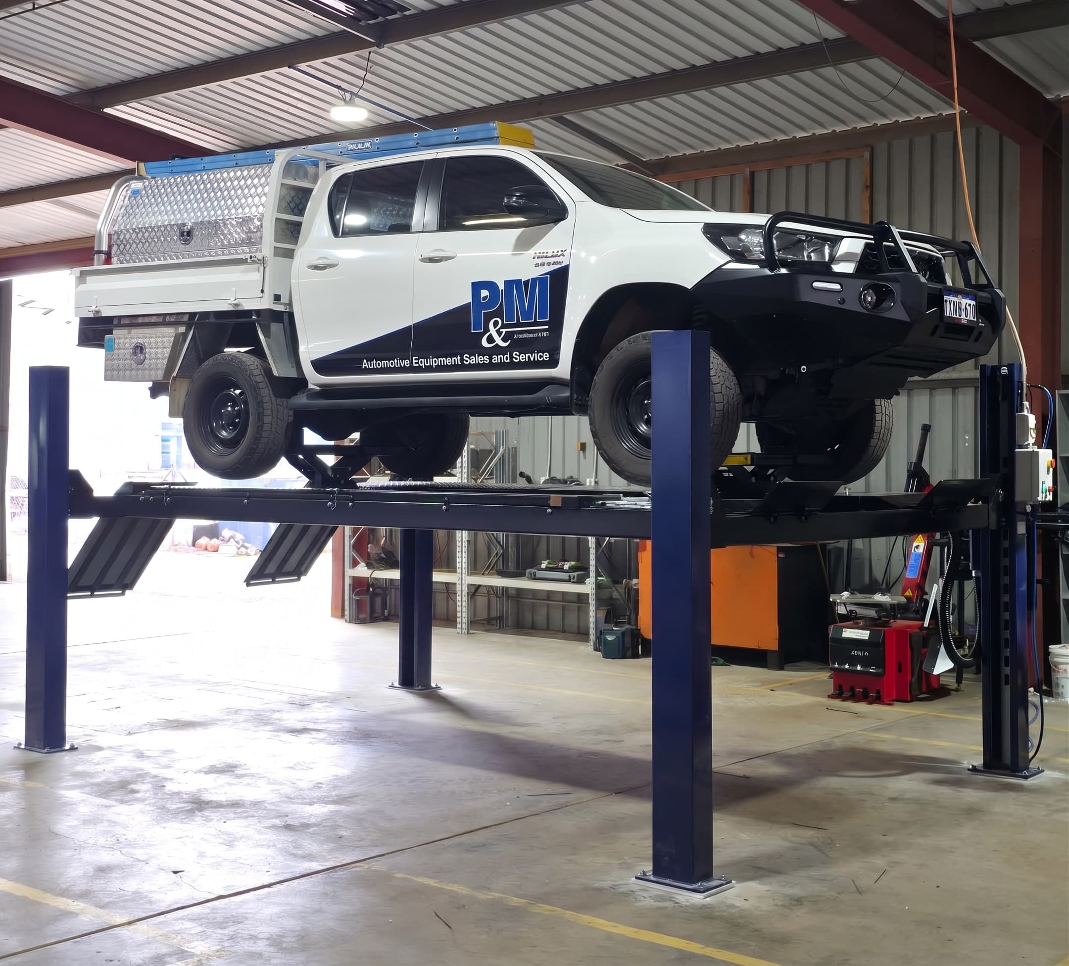 Hero — mechanic at car
